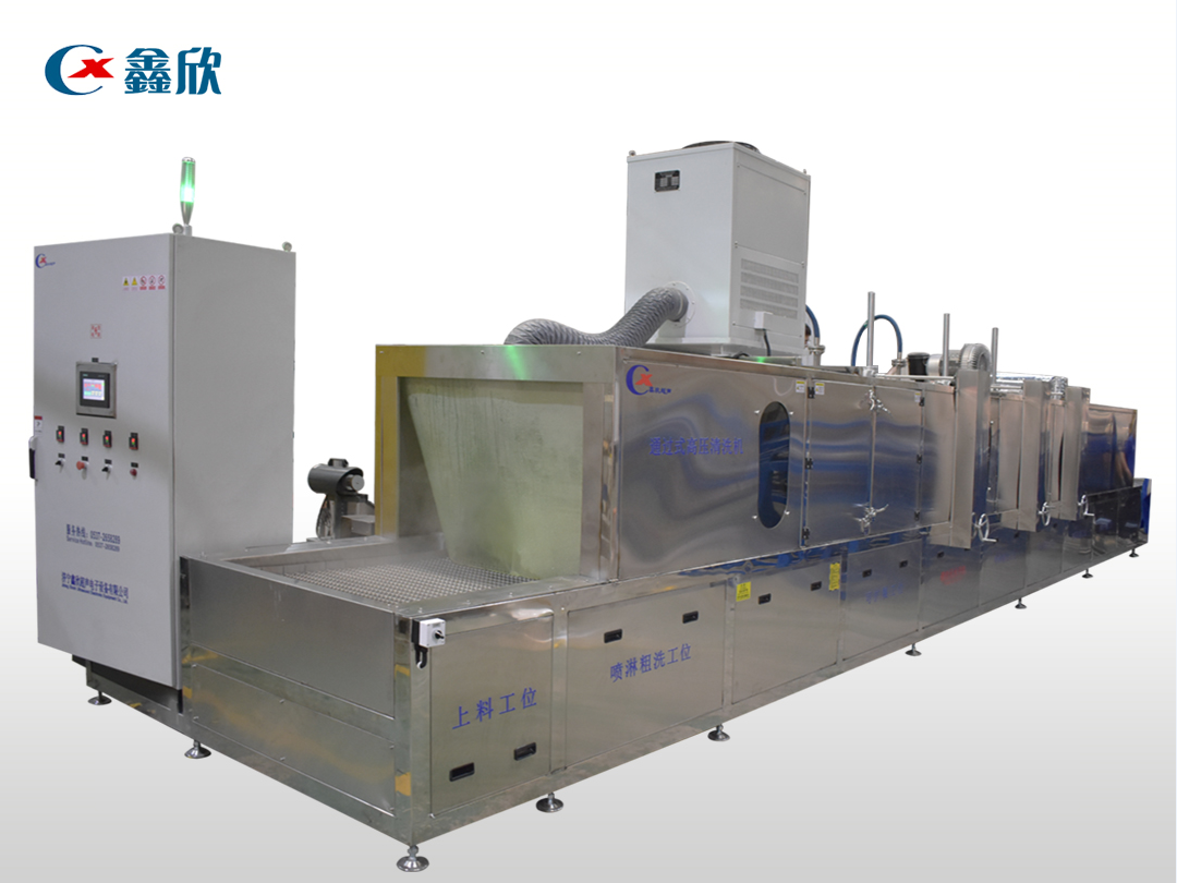 Fully automatic through spray cleaning and drying line